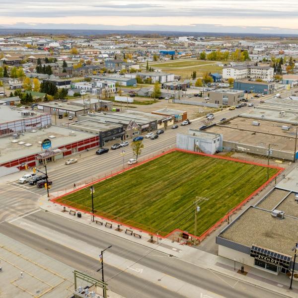 The grassy lot at 100 Avenue and 100 Street ready for development.